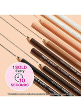 Multiple kohl eyeliner pencils with pointed tips laid out