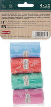 Mixed-color dog waste bags in blue, red, green, and pink paw-print roll packs