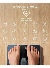 Smart digital body weight scale with 16 measurement icons and feet on platform