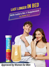 Effervescent supplement tube and peach drink with smiling couple in foreground