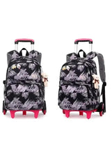 Kids rolling trolley backpack with black brushstroke print and pink wheels, two views