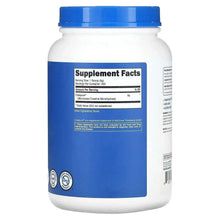Creatine monohydrate supplement facts label on white jar with blue cap