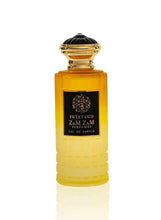 Amber unisex eau de parfum bottle with gold cap, 100 ml