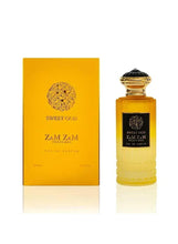 Sweet Oud Zam Zam eau de parfum set: yellow box and amber bottle with gold cap