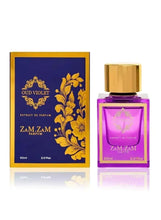 Perfume set with gold-capped purple bottle and dark blue gold floral box.