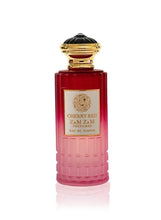 Red glass eau de parfum bottle with gold cap and gold-trimmed label