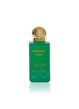 Men's eau de parfum bottle, green glass with gold cap and BEHIND YOU label
