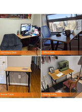 Adjustable laptop table in use, light wood tabletop with black legs