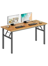 Adjustable laptop table with light wood top and gray/black legs, monitors on top
