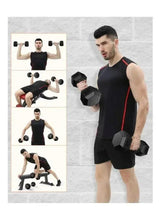 Black hex rubber dumbbells held at sides during a standing workout pose