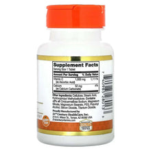Vitamin C supplement bottle back label with Supplement Facts and orange cap