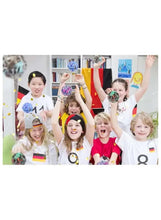 Group of children holding assorted rubber bounce balls