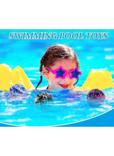 Multicolour rubber bounce ball floating in pool water with child