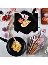 Cooking utensil set with pink silicone spatula and ladle used on stovetop pans.