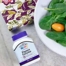 Chewable papaya enzyme bottle with green leaves and orange chewable tablets