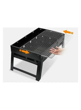 Black charcoal grill open top with wire cooking grate, showing interior