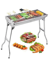 Portable charcoal BBQ grill with stainless cooking grate on folding stand