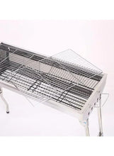 Open charcoal grill grate and warming rack on stainless steel portable frame