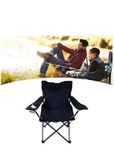 Folding camping chair with armrests and wide cushioned backrest, dark fabric