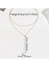 Layered pearl drop necklace with adjustable pendant chain and long pearl drop