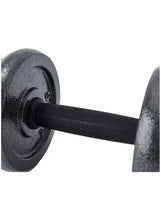 Close-up of adjustable dumbbell handle with textured weight plate and end cap