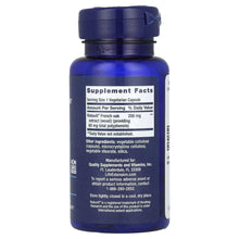 Supplement Facts label on blue dietary supplement bottle with dark cap
