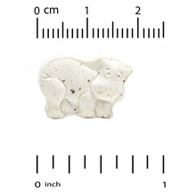 Chewable calcium with magnesium tablet pieces with measuring scale, off-white