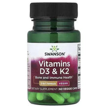 Swanson D3 & K2 vitamin supplement bottle with black cap and green capsules