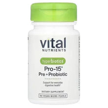 Probiotic supplement bottle with green cap and white label, Pro-15 Pre+Probiotic