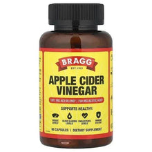 Bragg apple cider vinegar supplement bottle with black cap and yellow label