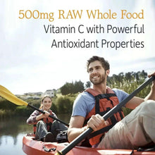 Vitamin Code RAW Vitamin C supplement promotional graphic with outdoor boat scene text