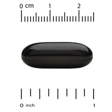 Black liquid softgel shown with measurement scale for size
