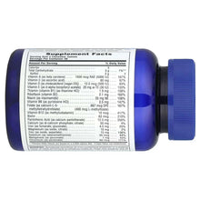 Supplement facts panel on dark blue bottle with side blue cap