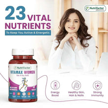 Vitamax Women multivitamin bottle with red cap and blue front label.