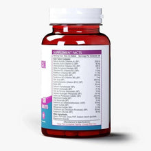 Vitamax Women supplement bottle back label, red cap, nutrition facts panel.