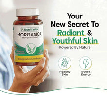 MORGANICA moringa leaf extract supplement bottle, 60 capsules, held in hand