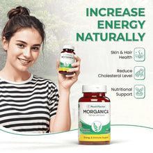 MORGANICA moringa leaf extract supplement bottle, 60 capsules, in person’s hand