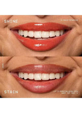 Red-brown lip gloss stain on lips with wet shine finish, showing shine and color
