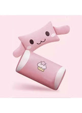 Pink gaming chair seat and back with plush cat and star emblem, angled view