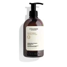 Shampoo bottle with black pump, amber-brown bottle and white label