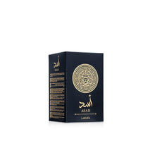 Asad Eau de Parfum box with gold emblem and gold ASAD text on dark blue