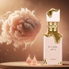 Lattafa Eclaire eau de parfum spray bottle, pink glass with gold cap and front label