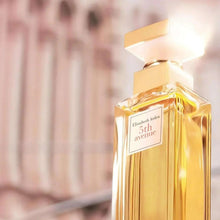 Amber eau de parfum bottle with gold cap and label, Elizabeth Arden 5th Avenue