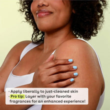 Hand applying eos vanilla cashmere body lotion to shoulder