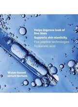 Blue water-based serum texture with floating bubbles and droplets