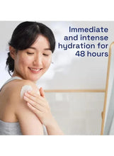 Moisturizing cream application on face by a smiling woman