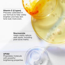Vitamin C and niacinamide serum in glass cups with golden and clear gel