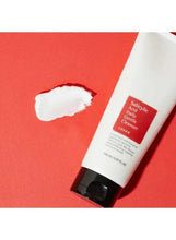 COSRX Salicylic Acid Daily Gentle Cleanser tube beside a white cream swatch