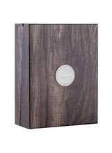 Wood-textured perfume box with ARMAF round emblem on front