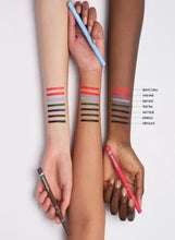 Eyeliner color swatches on arms with three felt-tip eyeliner pens